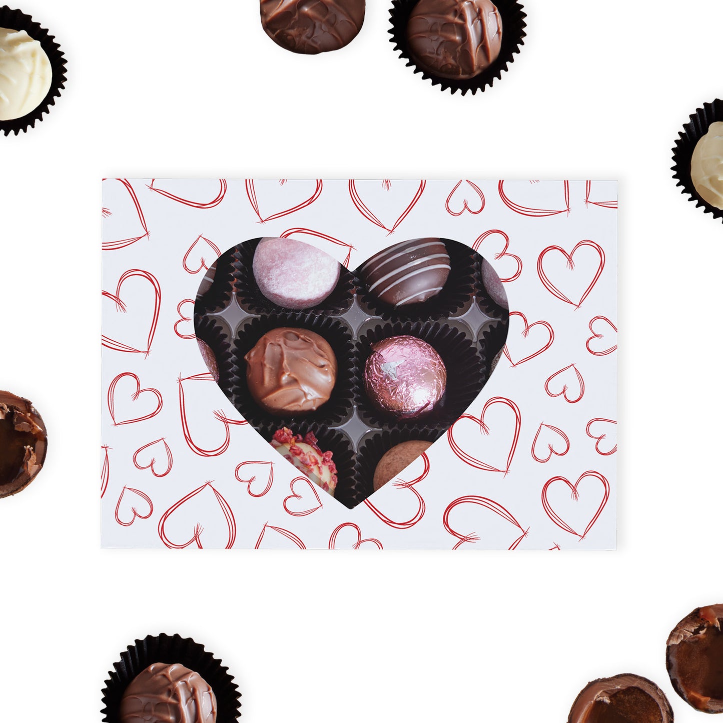 This premium gift box features a sophisticated love heart (Red & White) pattern, complete with a heart-shaped cutout that offers a tantalising glimpse of the luxurious chocolate truffles nestled inside. Each box contains a carefully curated collection of 12 milk, dark, and white chocolate truffles