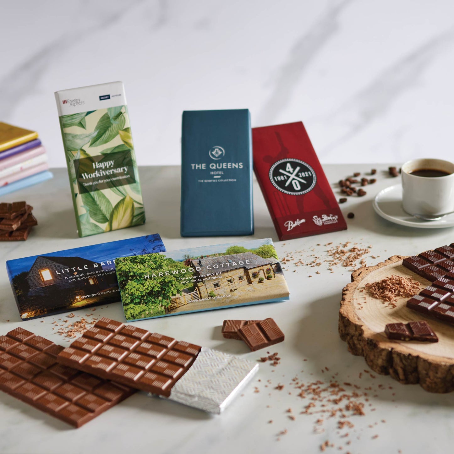 examples of previous milk chocolate 90g corporate branded gift bars. Custom chocolate bars that can carry images, logo and brand messages