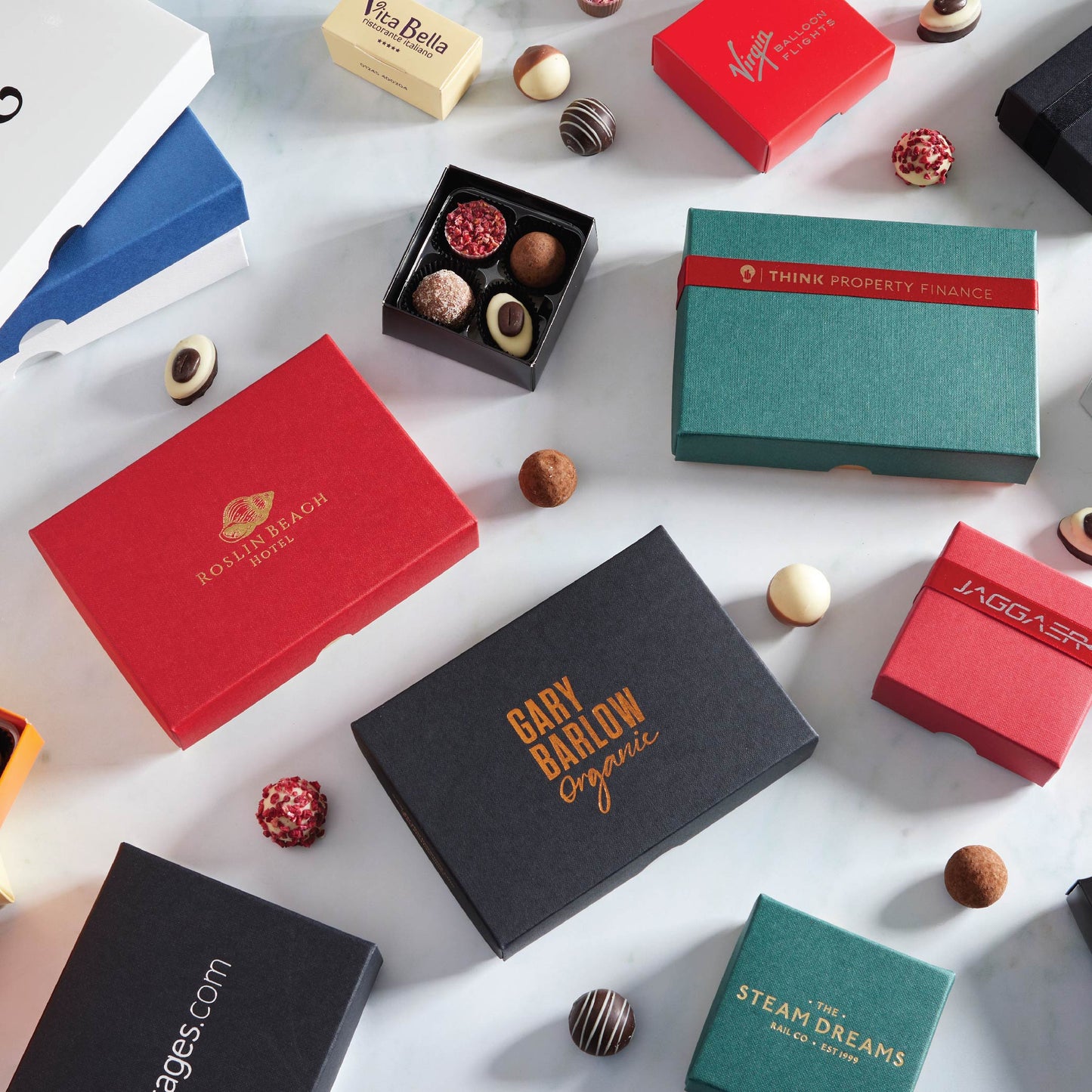 Examples of corporate branded gift boxes. Custom chocolate truffle gift boxes that can carry logos, patterns and brand messages