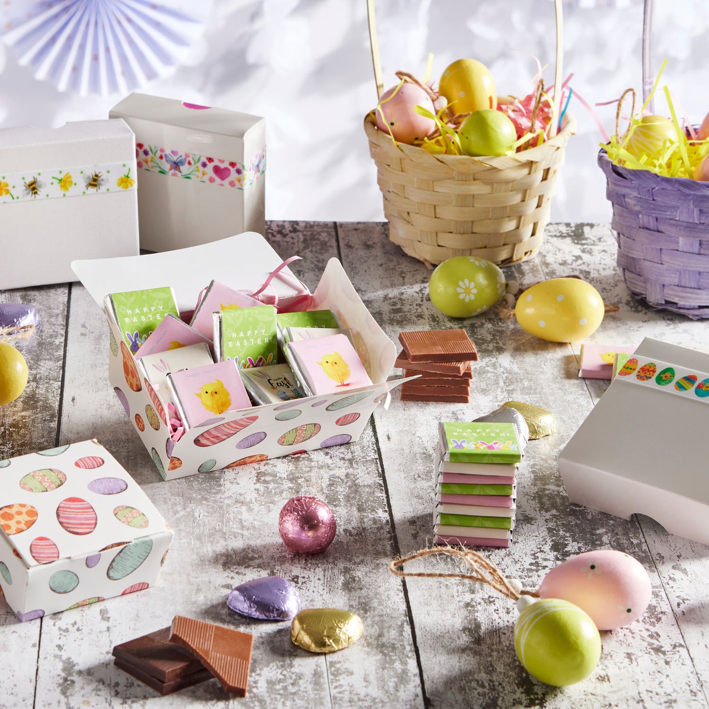 Milk Chocolate Neapolitans, beautifully crafted to add a touch of joy and indulgence to your Easter celebrations. Each of these 150 creamy milk chocolate pieces comes individually wrapped in Luxury foil and vibrant, full-colour paper wrappers, featuring three delightful Easter-themed designs