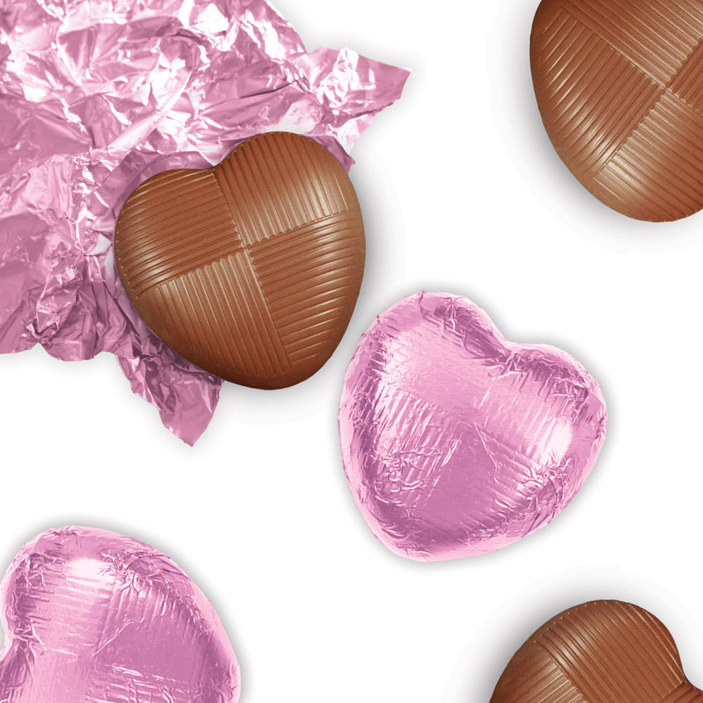 milk chocolate hearts individually wrapped in pink foil packed in 1kg boxes
