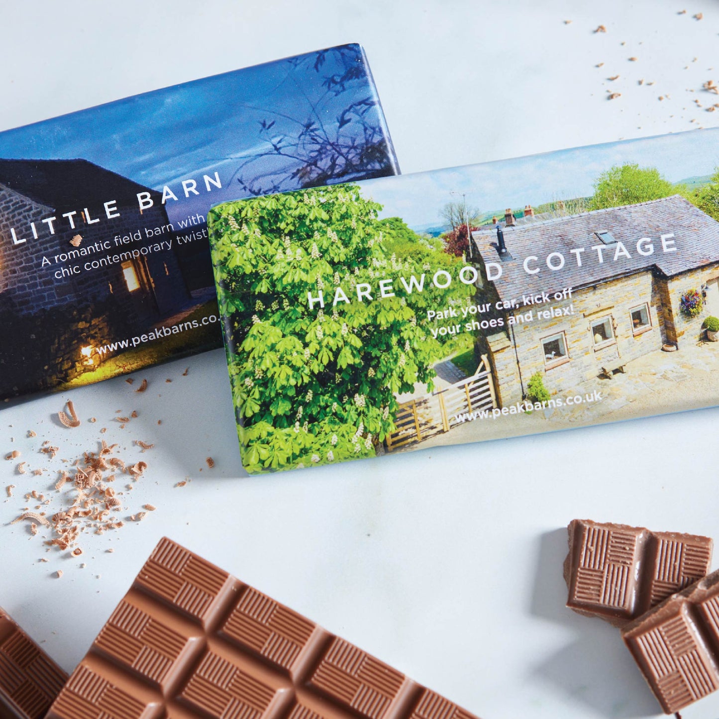 examples of previous milk chocolate 90g corporate branded gift bars. Custom chocolate bars that can carry images, logo and brand messages