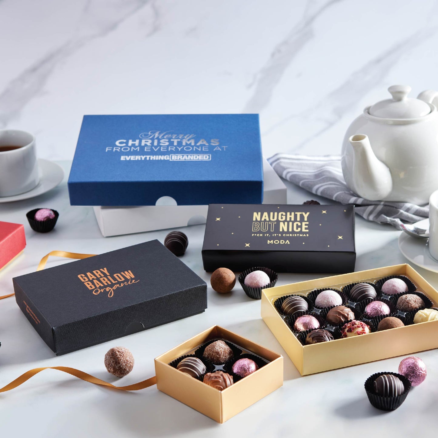 Examples of corporate branded gift boxes. Custom chocolate truffle gift boxes that can carry logos, patterns and brand messages