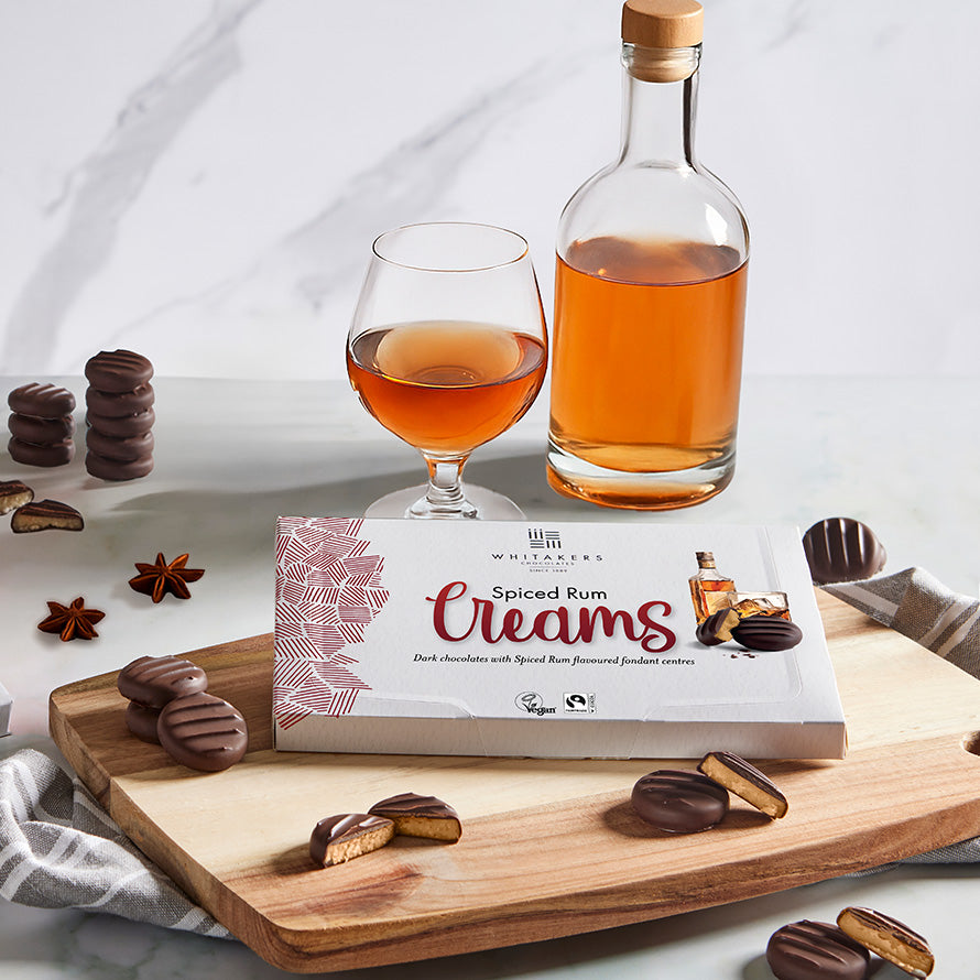 Taste the elegance of our Spiced Rum Creams, Dark Chocolates with a Spicy Rum Infused Fondant Centre (150g gift box)