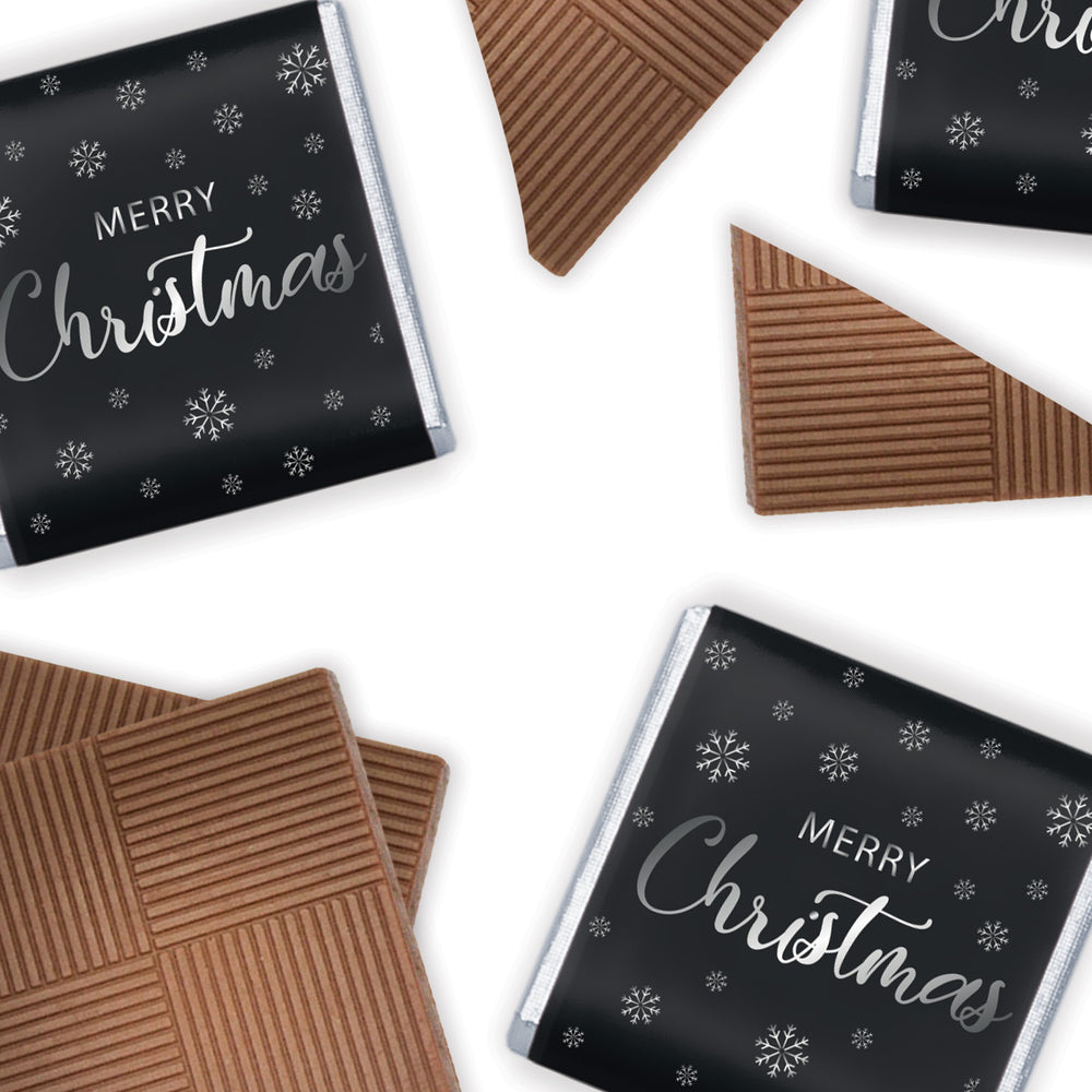 Merry Christmas-themed Milk Chocolate Neapolitans. Each of the 150 chocolates is crafted from smooth and creamy milk chocolate, individually wrapped in Luxury foil and encased in a paper wrapper adorned with a 'Merry Christmas' theme. These delightful treats, packed in a bulk 750g tub