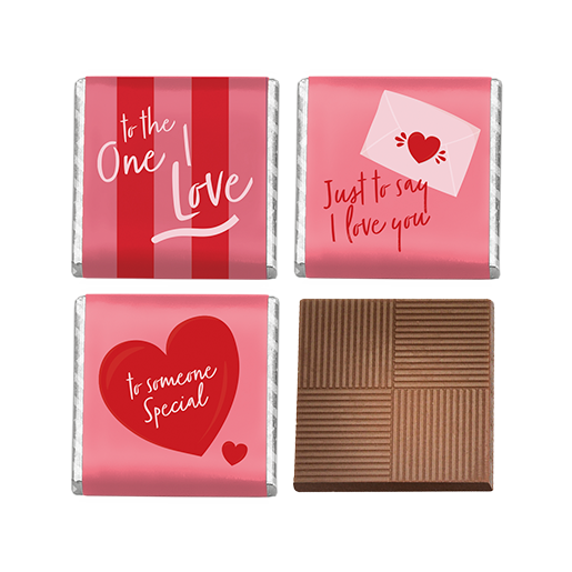 Four milk chocolate squares with Valentine's Day-themed packaging on a white background