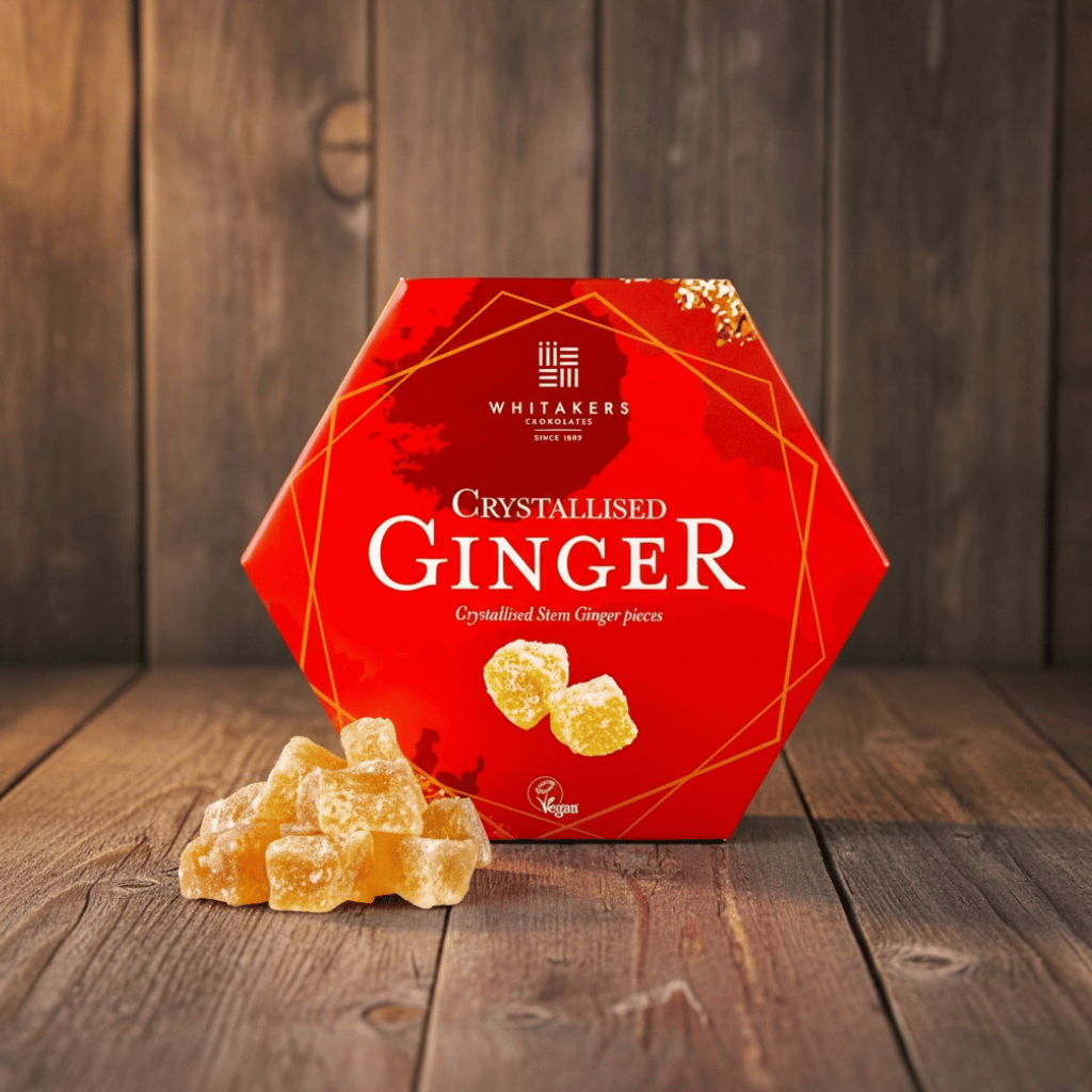 box of Whitakers crystallised ginger on a rustic wooden surface
