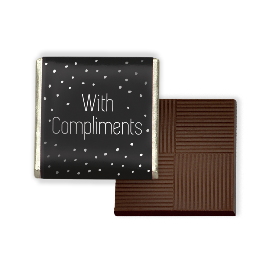 Dark Mint Chocolate Neapolitans, each piece a celebration of the rich, bold flavours of dark chocolate infused with the cool, refreshing essence of mint. Encased in elegant foil and paper wrappers that feature a sleek black background with 'with compliments' elegantly printed in silver. Packed in 2kg bulk catering boxes