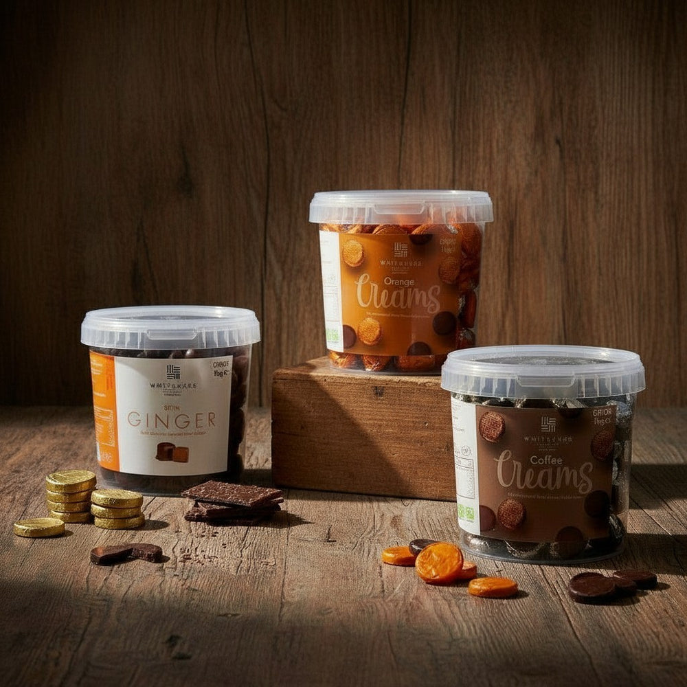 Three containers of different flavours on a wooden surface with a wooden background